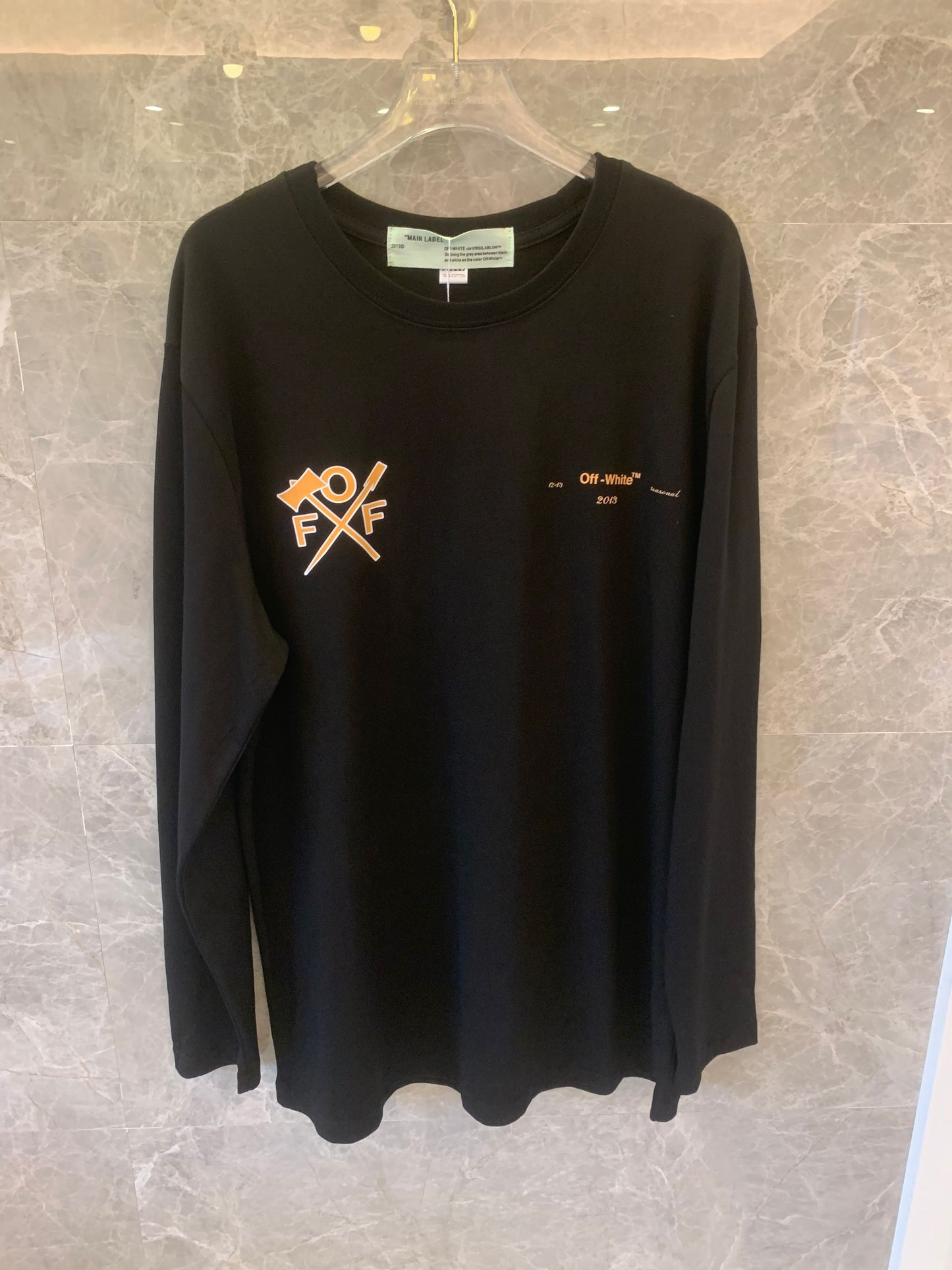 Off-White™ "Arrows" black long-sleeve t-shirt with bold orange graphics