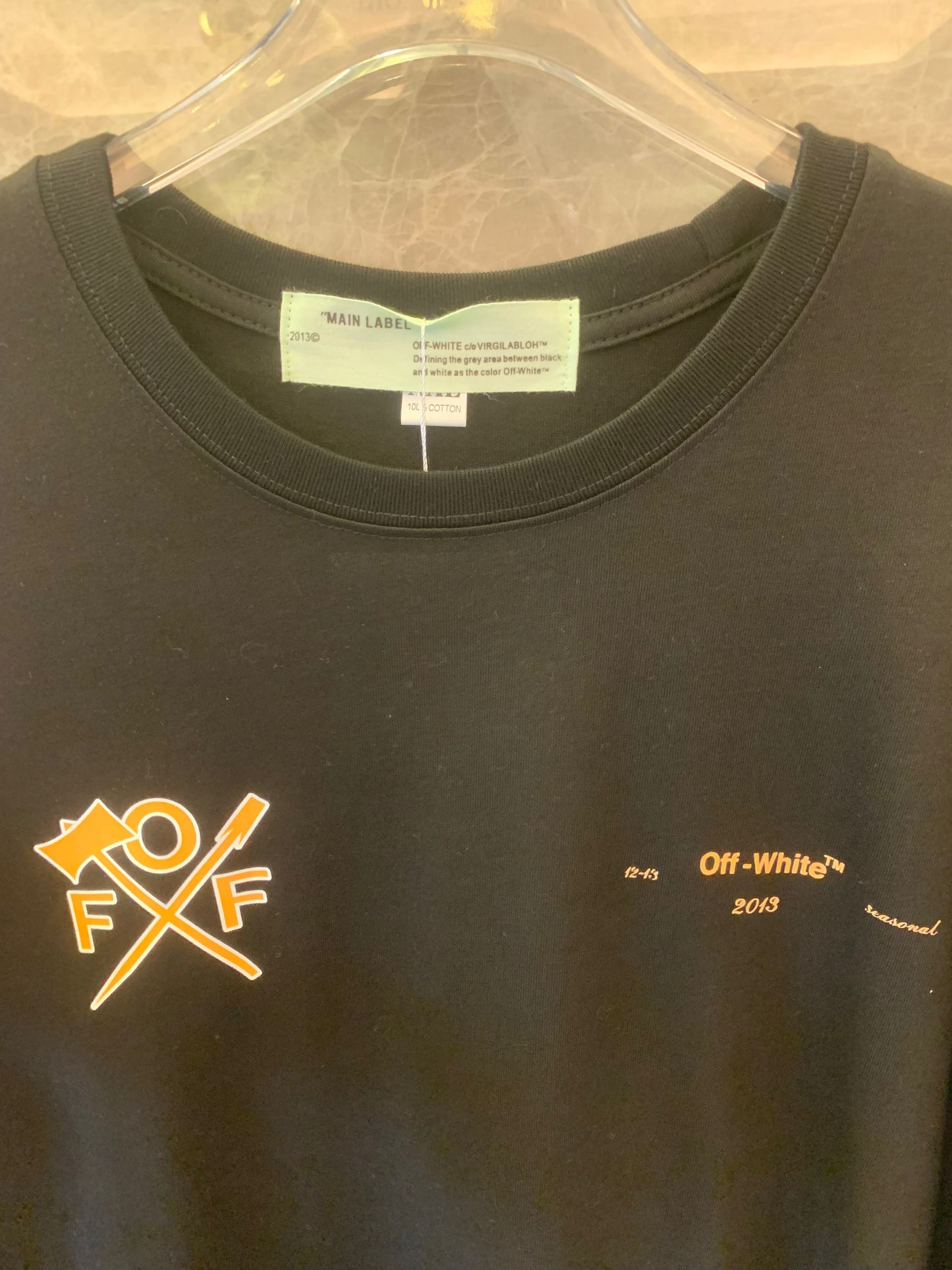 Off-White™ "Arrows" black long-sleeve t-shirt with bold orange graphics