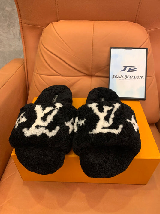 Slides felpudos Louis Vuitton
