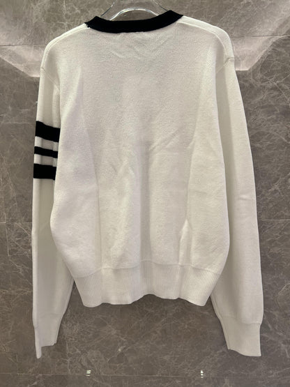 Chanel Classic White Knit Cardigan with Black Detailing and CC Logo