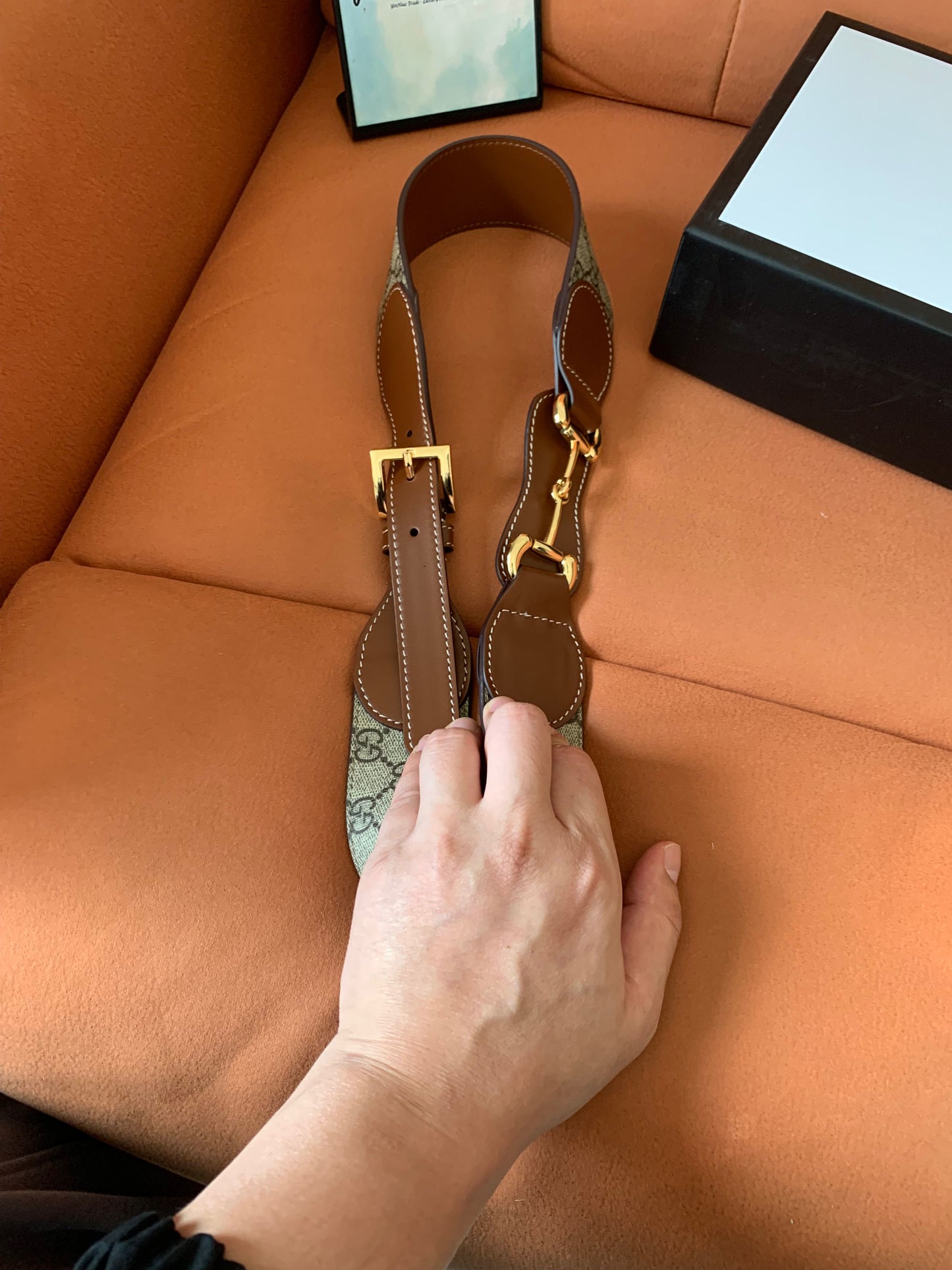 Cinto Gucci GG Supreme de lona e couro marrom com fivela dourada