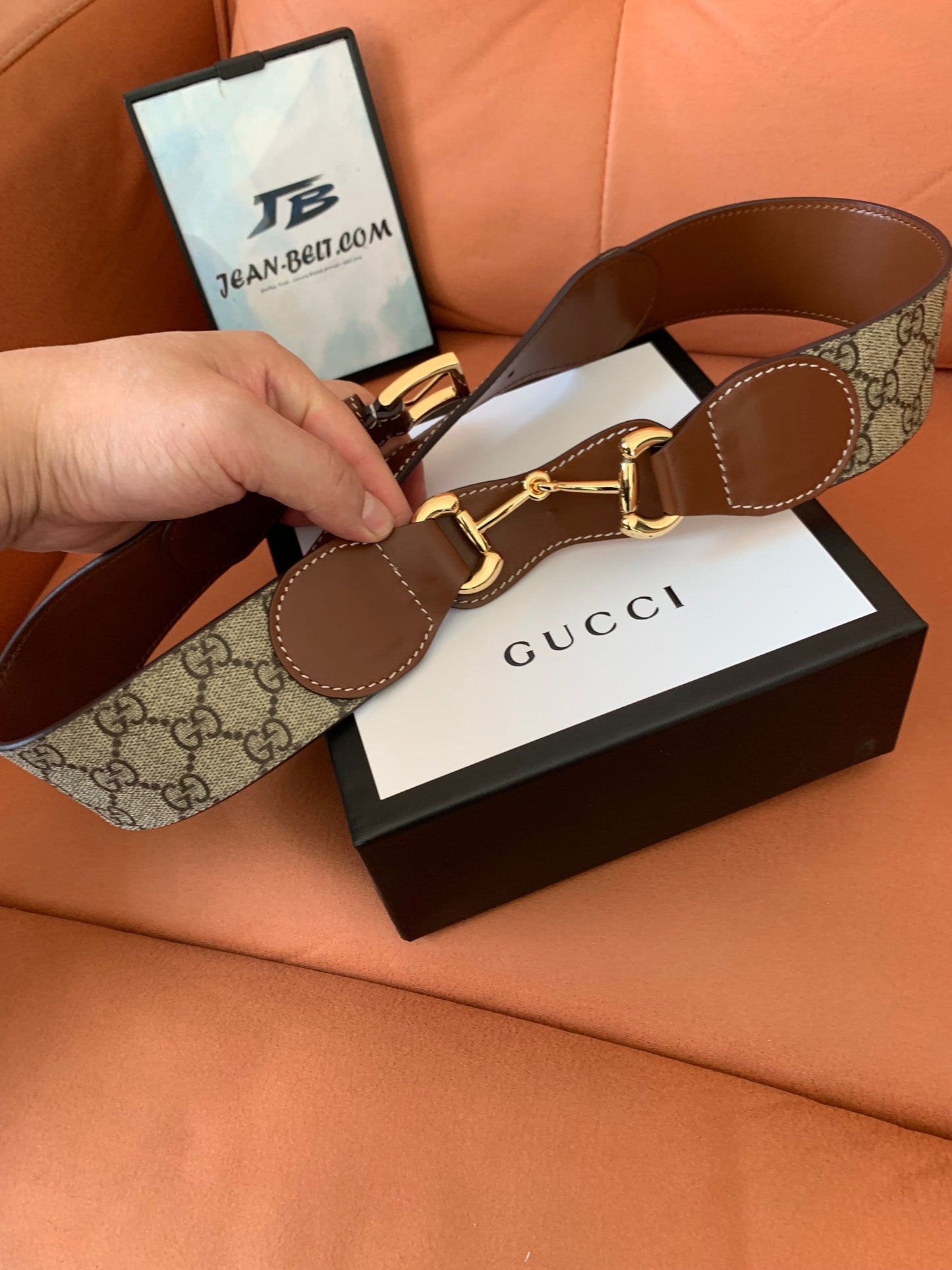 Cinto Gucci GG Supreme de lona e couro marrom com fivela dourada