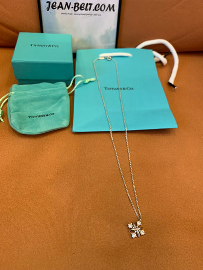 Tiffany & Co. diamond cross pendant necklace