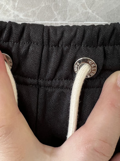 Celine Men's Black Track Pants with White Side Stripes