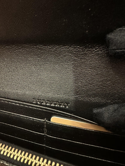 Cartera Burberry de piel y cuadros vintage con correa