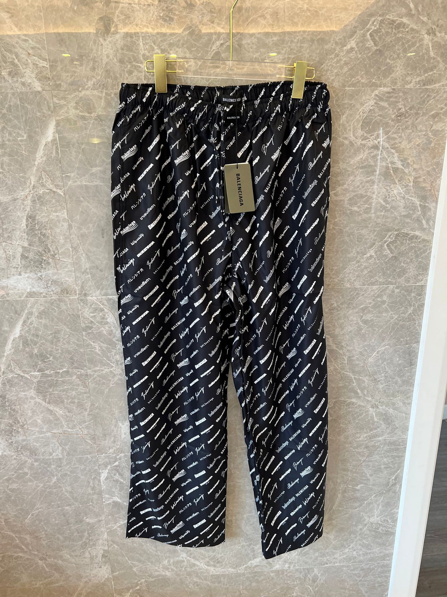Balenciaga All-Over Logo Track Pants in Black