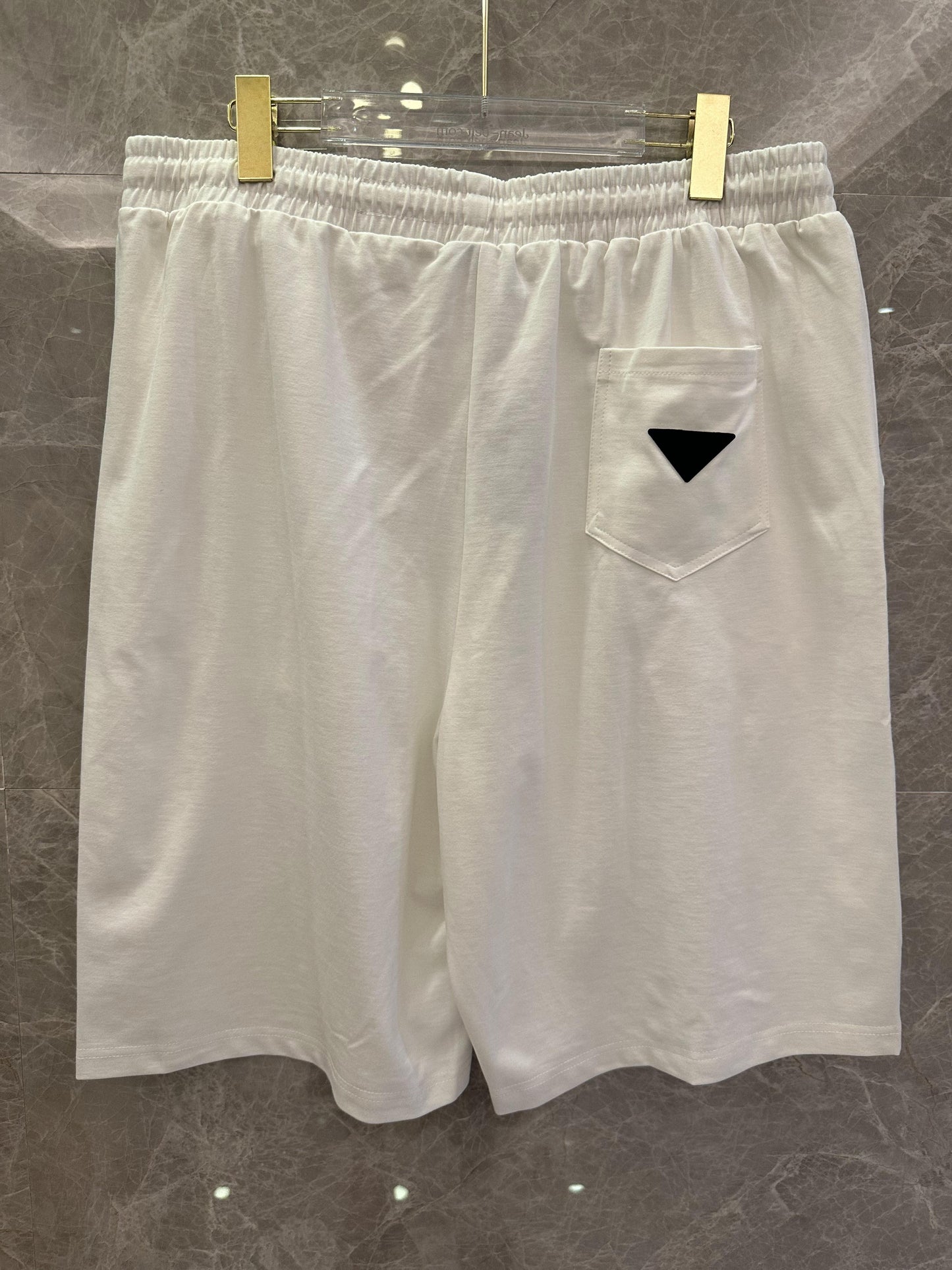 Prada black and white shorts with red stripe and logo patch