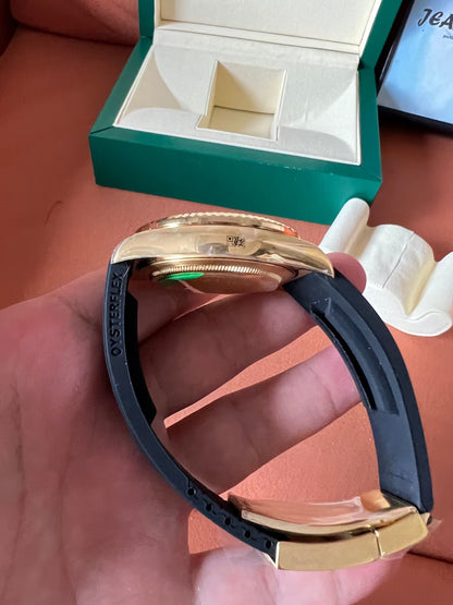 Rolex Sky-Dweller 18K gold with black dial and oysterflex strap