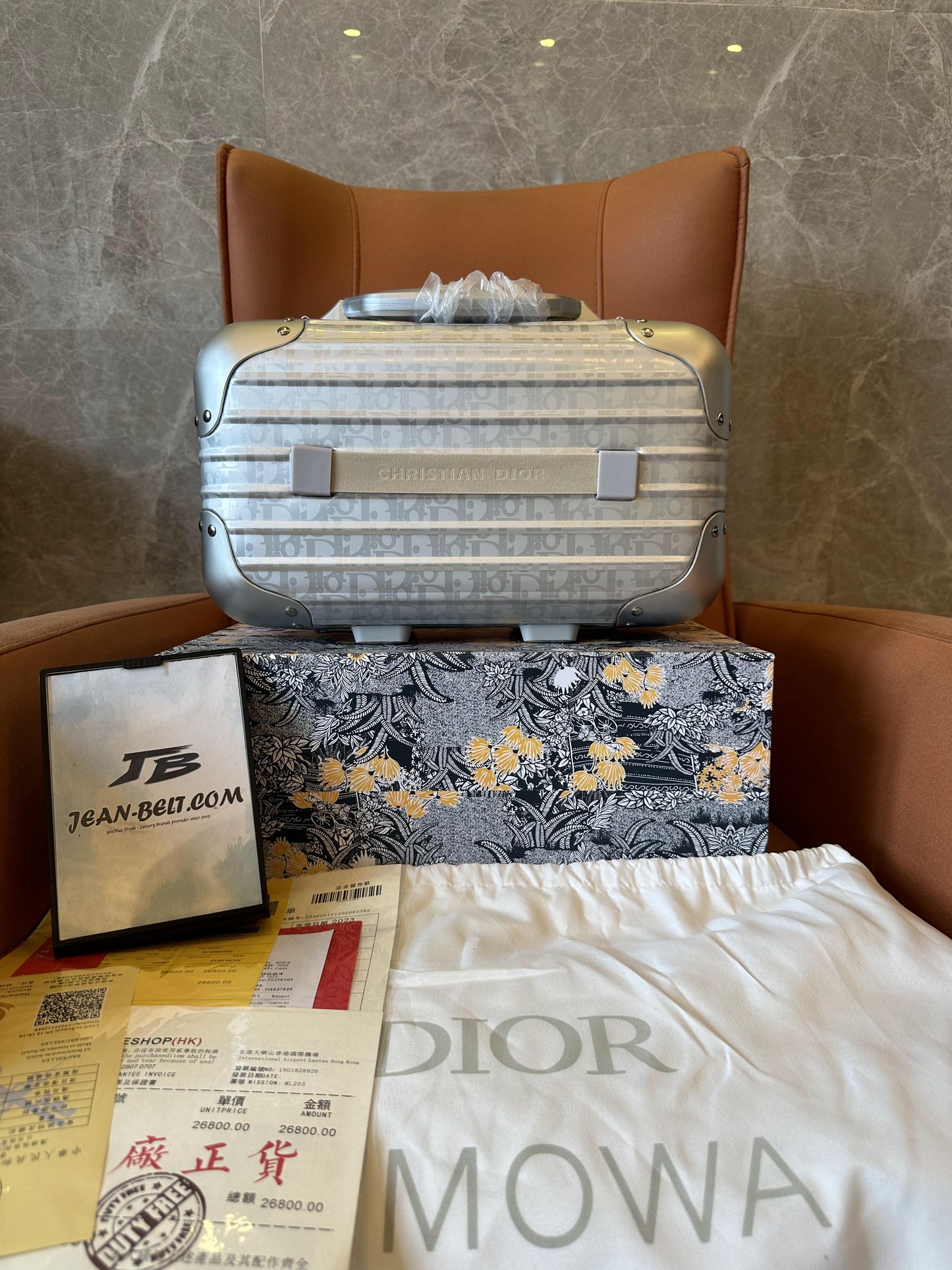 Valise à main grise Dior × Rimowa