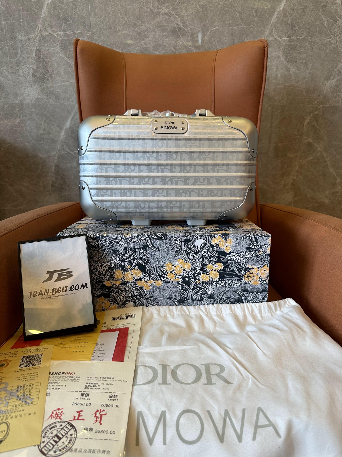 Valise à main grise Dior × Rimowa