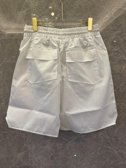 Shorts de banho Rhude com estampa tropical branca e cordão