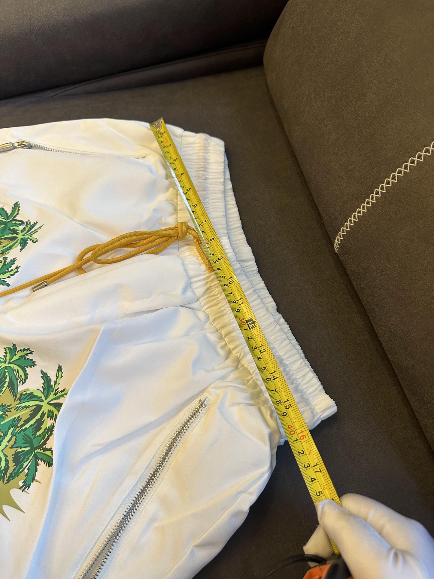 Shorts de banho Rhude com estampa tropical branca e cordão