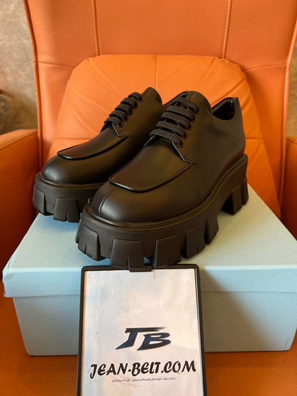 Prada Monolith lace-up loafers