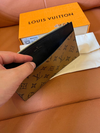 Louis Vuitton monogram canvas and leather pochette