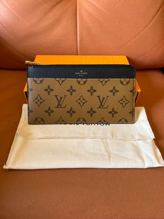 Bolsa Louis Vuitton monograma em lona e couro