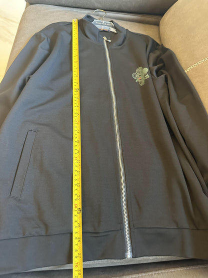 Conjunto de chándal con cremallera y bordado de trébol de Louis Vuitton