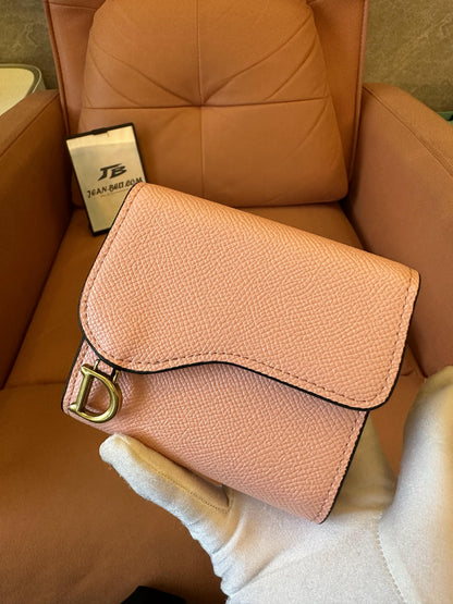 Cartera Dior Saddle Lotus de piel de becerro granulada rosa