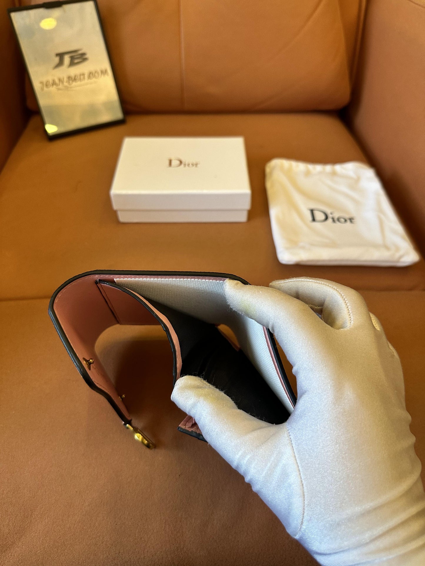 Cartera Dior Saddle Lotus de piel de becerro granulada rosa