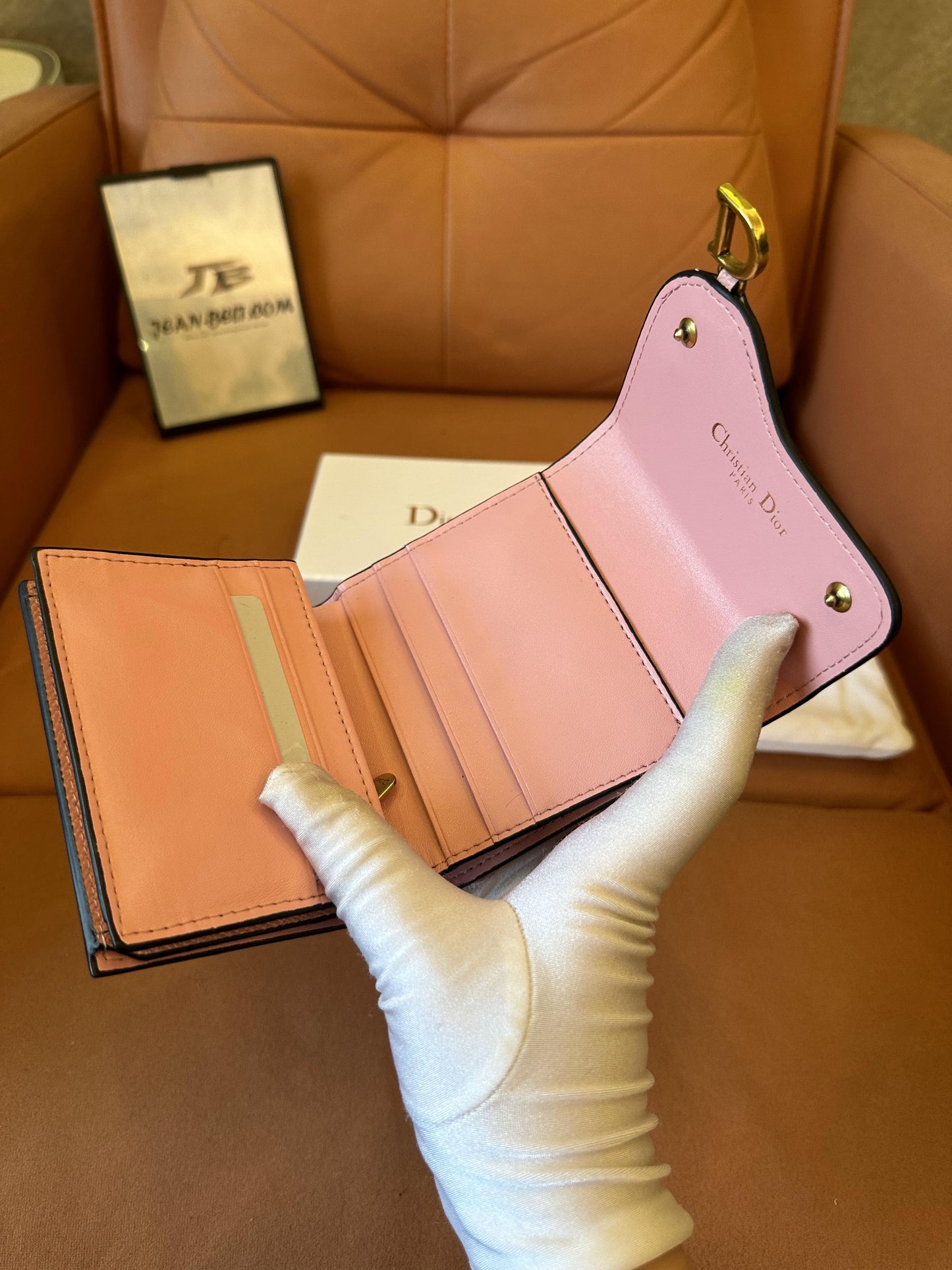 Cartera Dior Saddle Lotus de piel de becerro granulada rosa