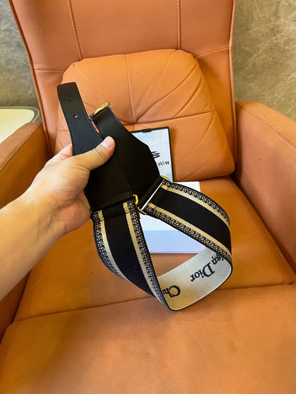 Cinturón de lona ajustable de Christian Dior con hebilla dorada