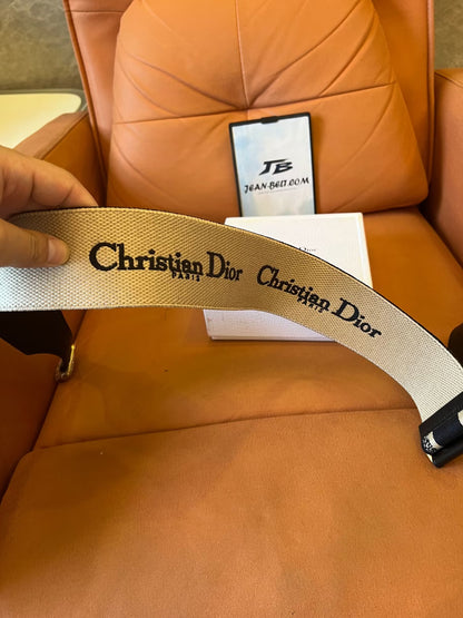 Cinturón de lona ajustable de Christian Dior con hebilla dorada