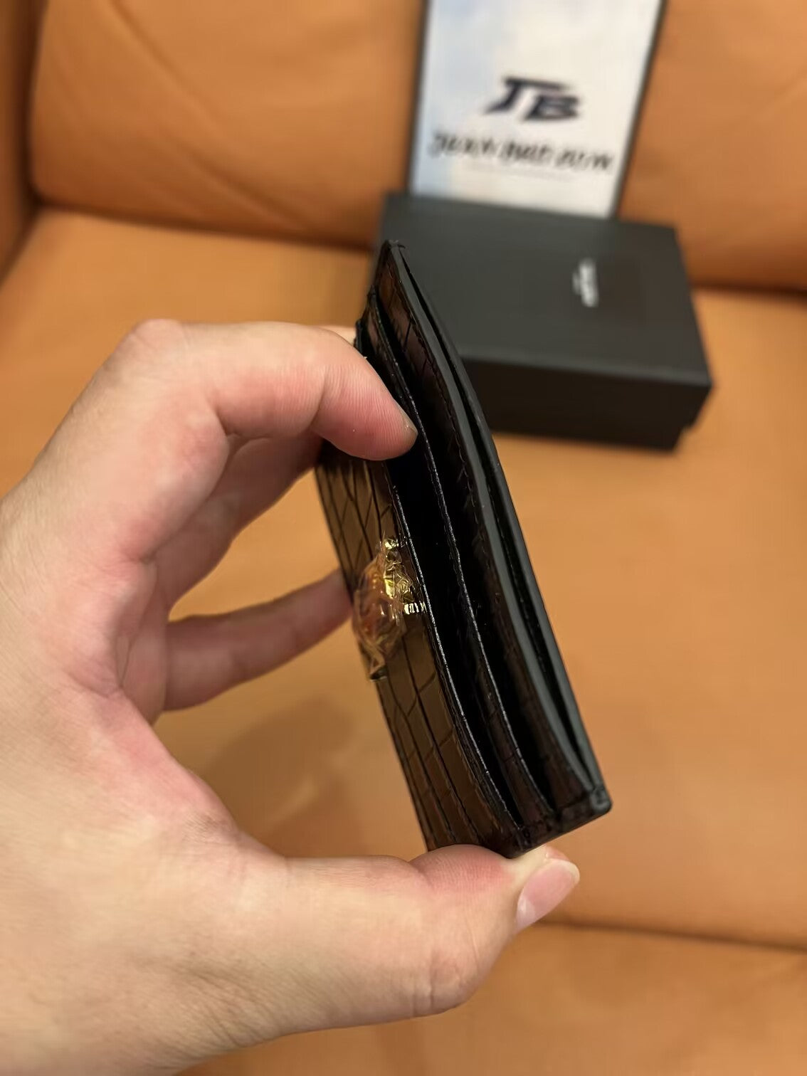 Saint Laurent monogram crocodile-embossed card holder in black