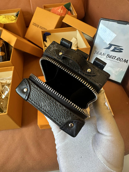 Louis Vuitton monogram black leather key pouch with rivet details