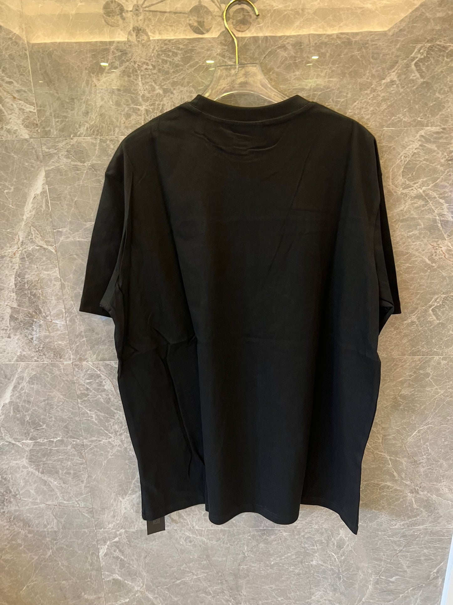 Camiseta negra con logotipo floral de Kith