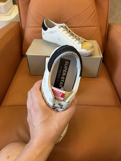 Zapatillas Golden Goose Superstar blancas y azules
