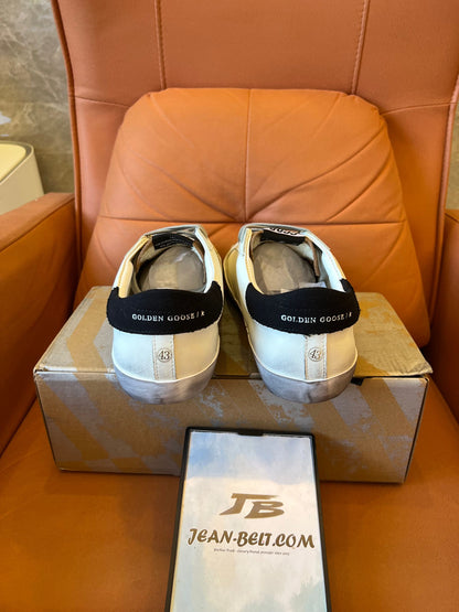 Tênis Golden Goose Superstar de couro baixo com estampa de estrela azul