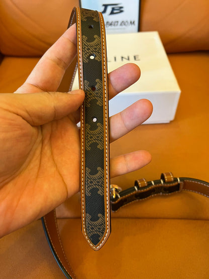 Cinturón Celine Triomphe de lona y piel con hebilla Triomphe dorada