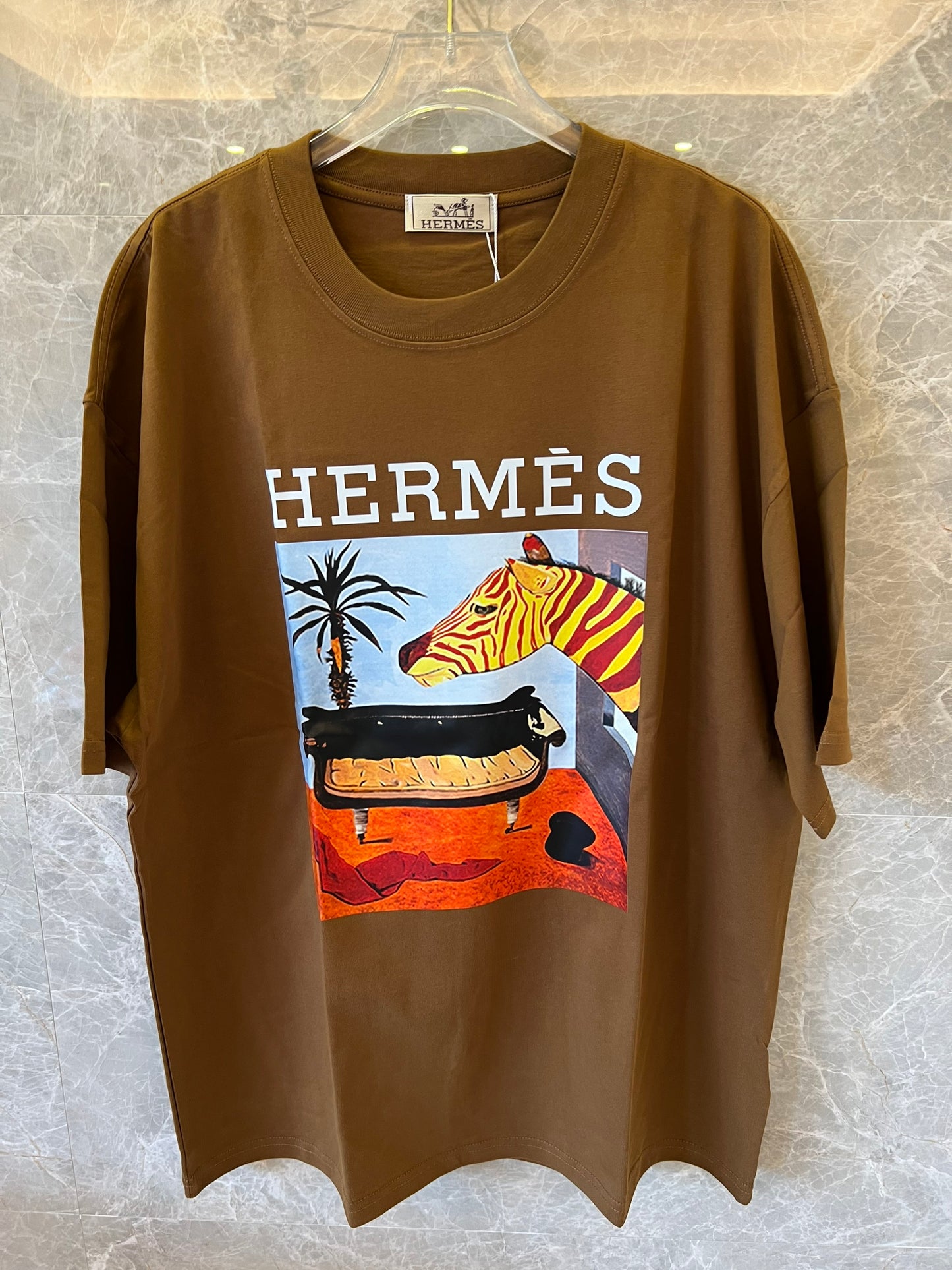 Camiseta con estampado gráfico de Hermès en algodón marrón
