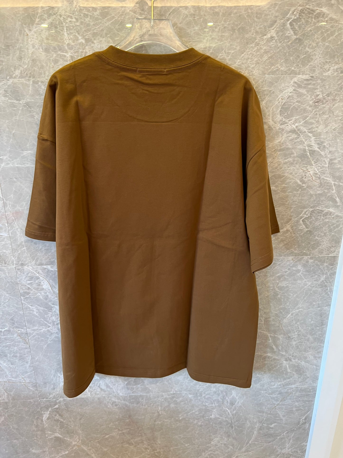 Camiseta con estampado gráfico de Hermès en algodón marrón