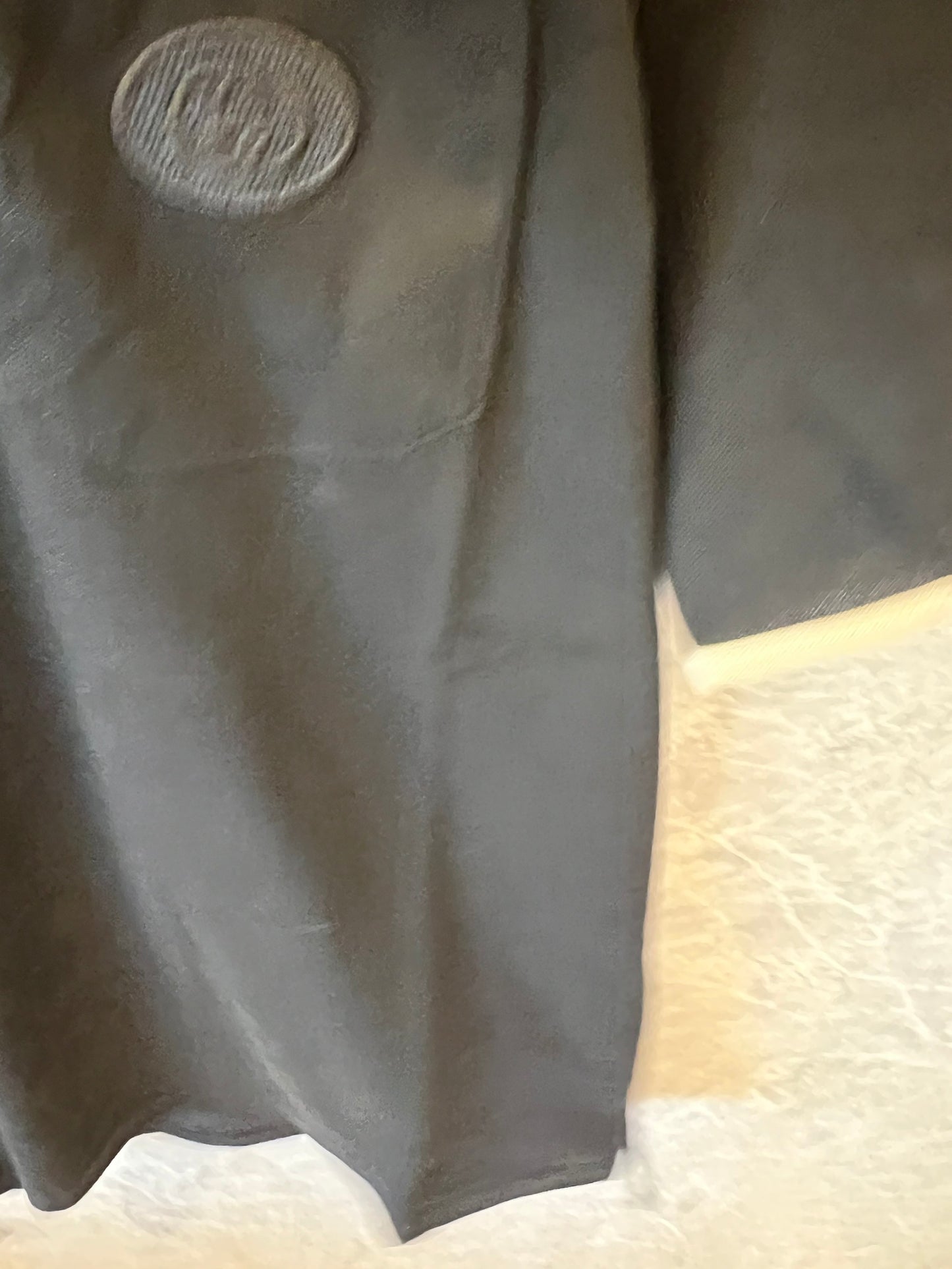 Polo negro Gucci con icónicas rayas tribanda