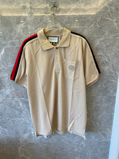 Polo Gucci con bloques de color y mangas a rayas rojas y verdes