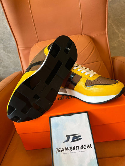 Zapatillas deportivas Hermes en amarillo y marrón