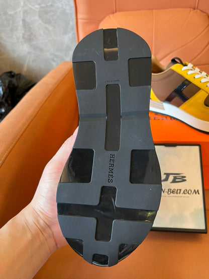 Zapatillas deportivas Hermes en amarillo y marrón