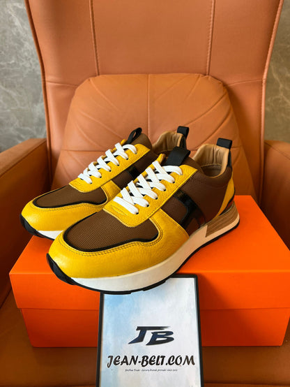 Zapatillas deportivas Hermes en amarillo y marrón