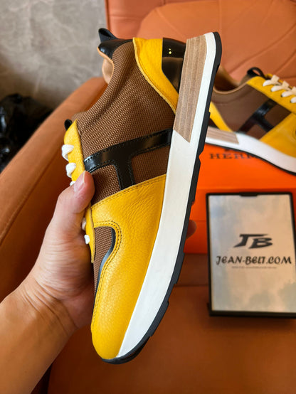 Zapatillas deportivas Hermes en amarillo y marrón