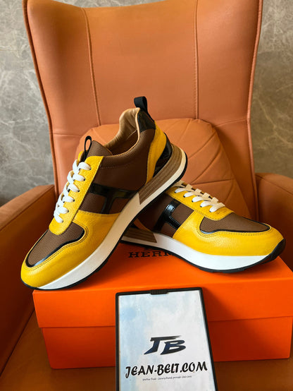 Zapatillas deportivas Hermes en amarillo y marrón