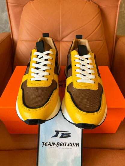 Zapatillas deportivas Hermes en amarillo y marrón