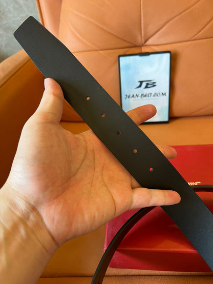 Cinturón Salvatore Ferragamo de piel negra repujada con hebilla gancini plateada