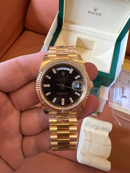 Rolex Day-Date 40 black dial 18K yellow gold watch