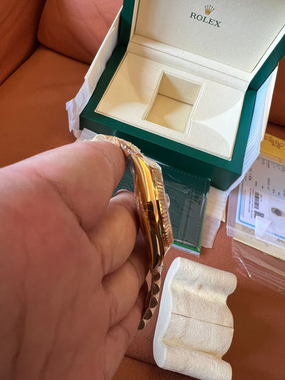 Rolex Day-Date 40 black dial 18K yellow gold watch