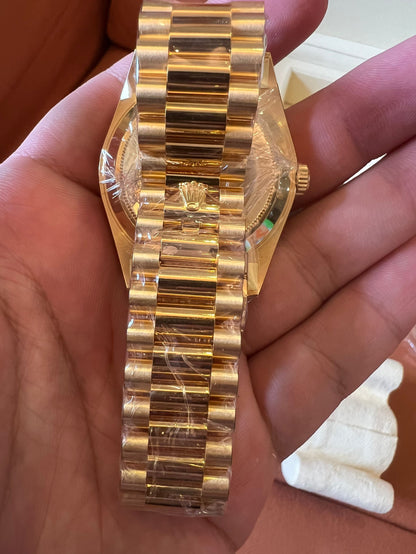 Rolex Day-Date 40 black dial 18K yellow gold watch