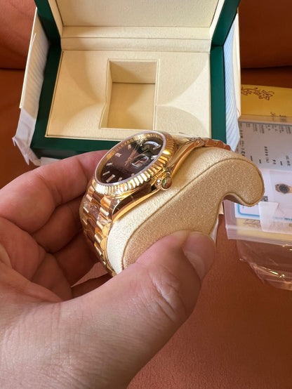 Rolex Day-Date 40 black dial 18K yellow gold watch