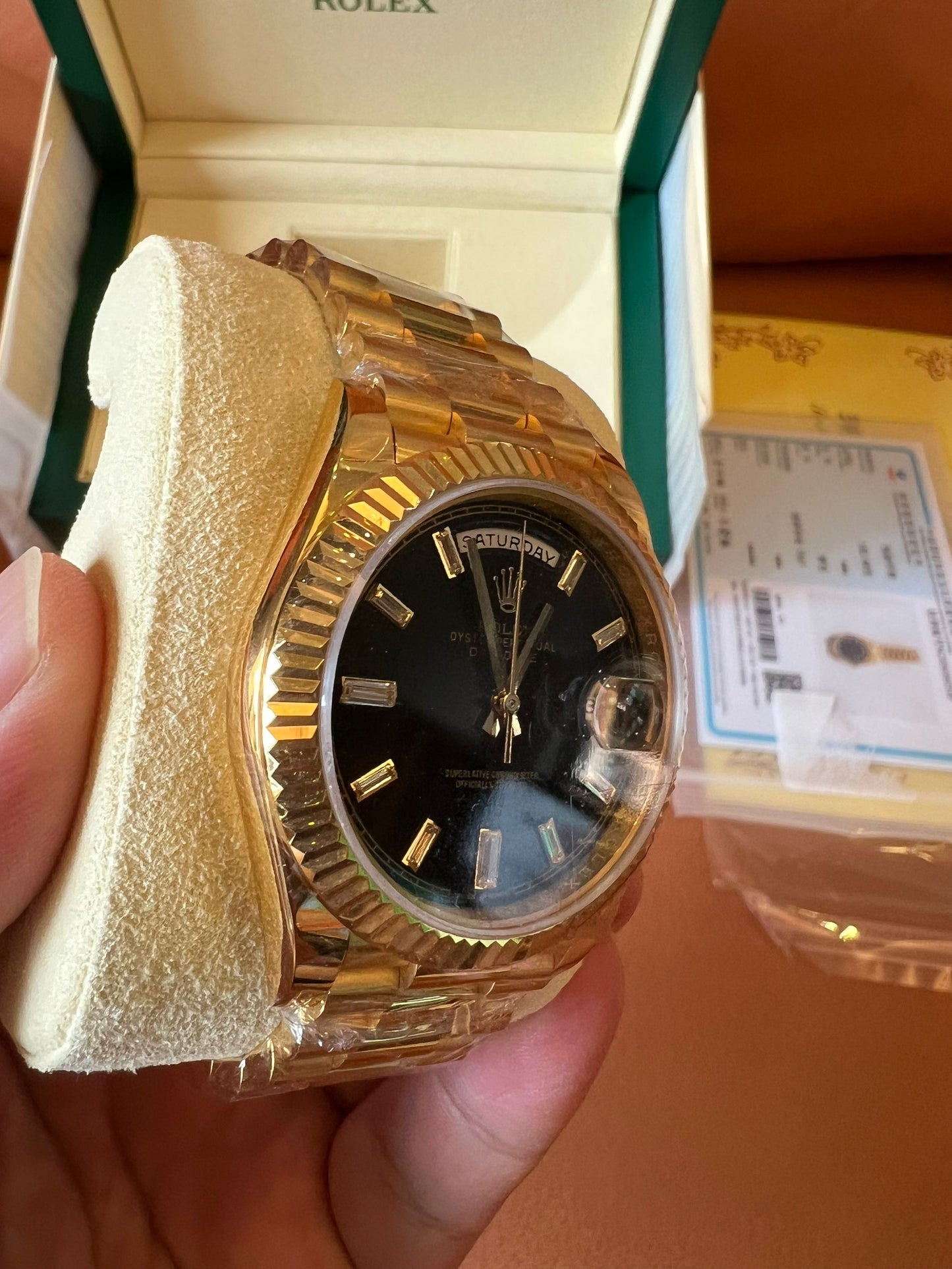 Rolex Day-Date 40 black dial 18K yellow gold watch