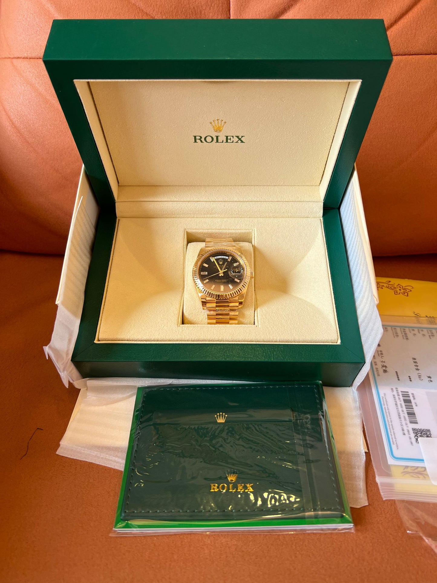 Rolex Day-Date 40 black dial 18K yellow gold watch