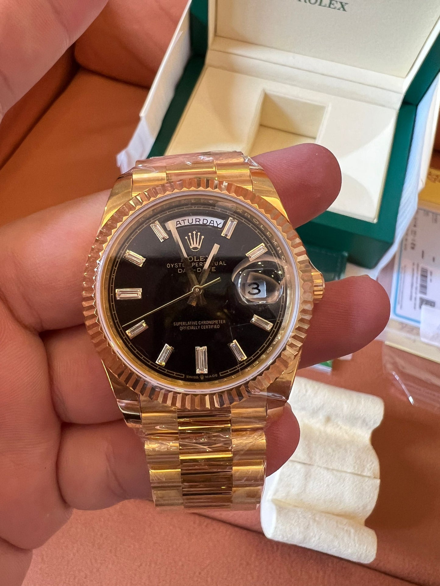 Rolex Day-Date 40 black dial 18K yellow gold watch