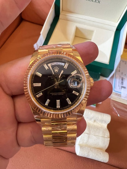 Rolex Day-Date 40 black dial 18K yellow gold watch